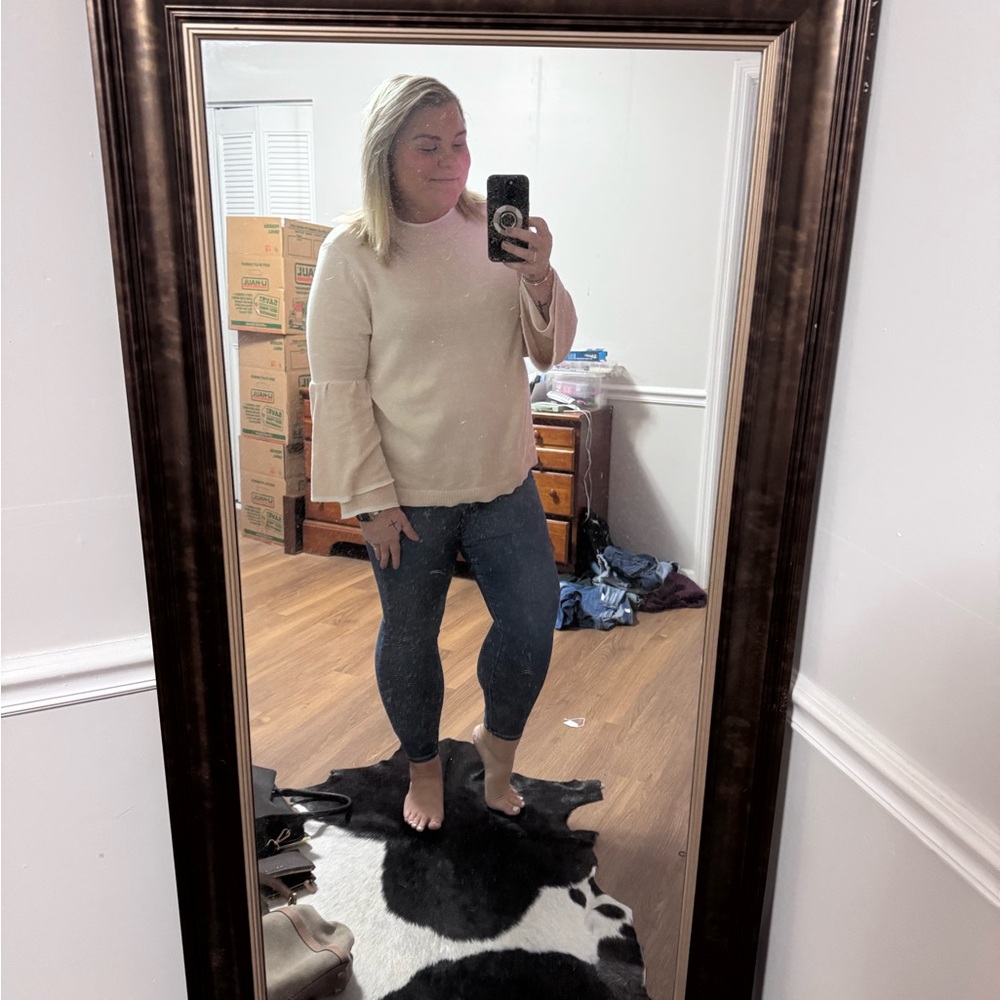 Cream Sweater with Blue Jeans